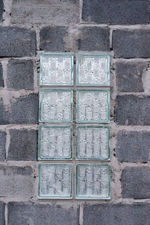 Glass block on the concrete wallの写真素材