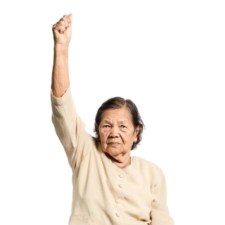 portrait of a senior woman exercising. Isolated on white background with clipping pathの写真素材
