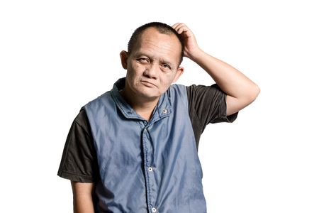 Portrait of a man with down syndrome. Isolated on white background with copy space and clipping pathの写真素材