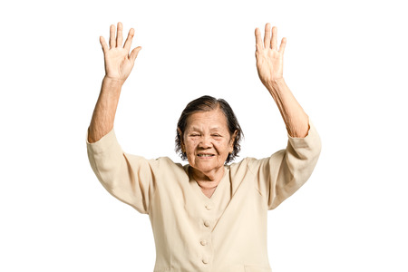 portrait of a senior woman exercising. Isolated on white background with clipping pathの写真素材