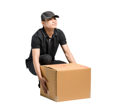 Portrait of an asian delivery man. Isolated on white background with copy space and clipping pathの写真素材