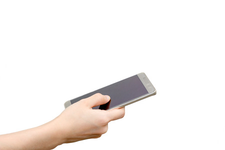 Female hand holding a phone. Isolated full length on white background with copy space and clipping...