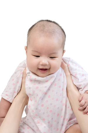Portrait of happy asian mother hugging her cute little baby. Isolated on white background with clipping pathの写真素材