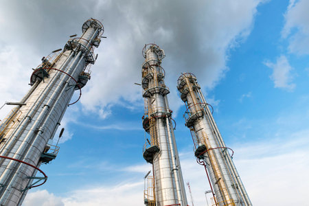 Three distillation towers point to sky : Oil and Gas Refineryの写真素材