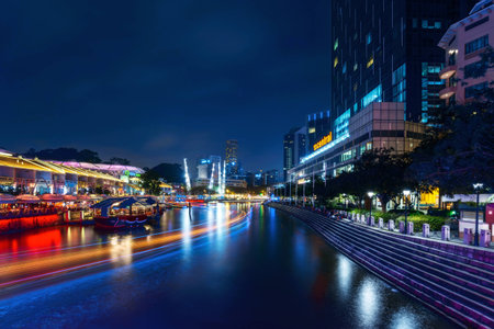 Singapore - FEBUARY 2, 2015: Night at Clarke Quay. Clarke Quay is a historical riverside quay in Singapore - a popular touristic destination and night life centerのeditorial素材