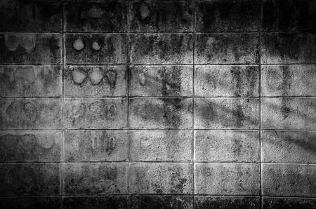 Black and white wall With a hundred different stainsの写真素材