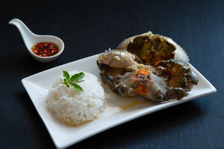 Fresh female Crab fermented ( Pu Dong ) with spicy chili,fish sauce,lime,whisky . Recommended dishes in Thailandの写真素材
