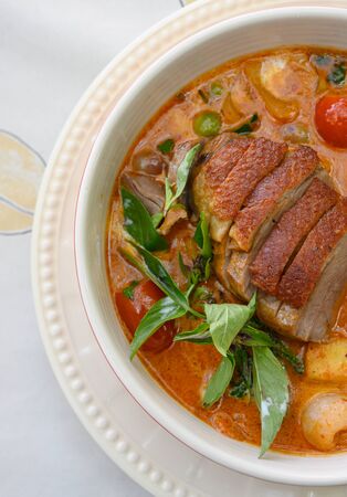Kaeng Pled Ped Yang (Roasted Duck in Red Curry with tomato,pineapple,Lychee prepared in coconut milk).の写真素材