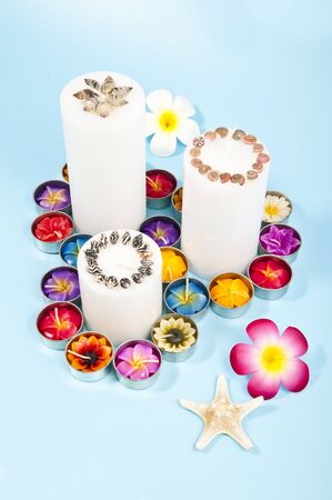 Three candles and star fishの写真素材