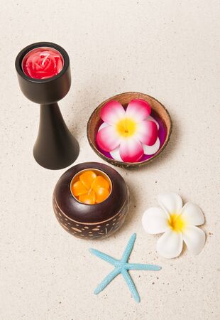  	Thai Candle set with flower and sea shellの写真素材