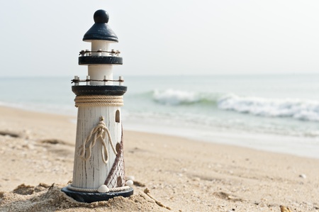 Close up light house on the beachの写真素材