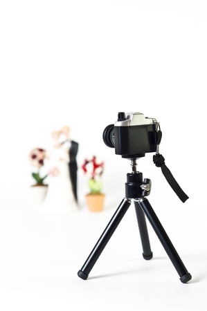 Film camera on tripod point Wedding coupleの写真素材