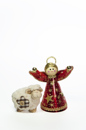 Red angel with white sheep isolated on white backgroundの写真素材