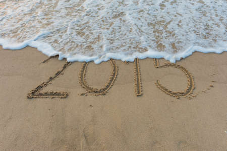 Wave wipe 2015 drawing on sandの写真素材