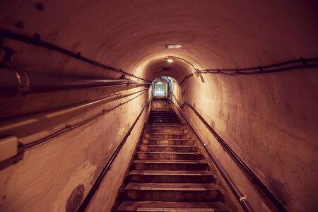 long tunnel with ladderの写真素材