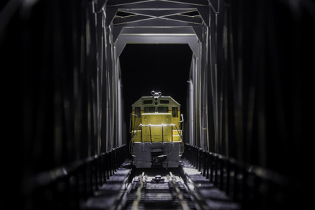 Yellow train on the bridge