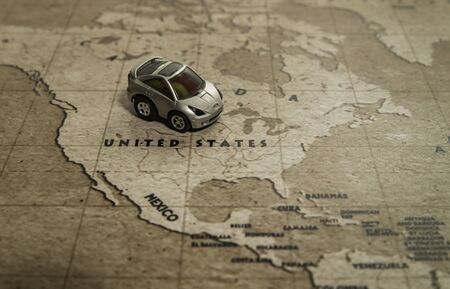 One toy car park on United states country in world mapの写真素材