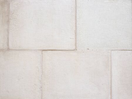 White stone brick wall texture background. Macro view