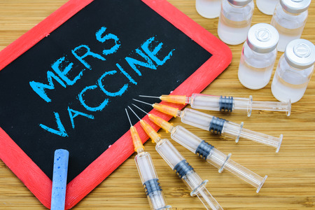 Concept of vaccine to cure Middle East Respiratory Syndrome (MERS) which is viral respiratory illnessの写真素材