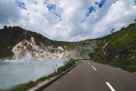 Road side along the Sulfur Hot spring at Oyunuma Lake, Noboribetsu Onsen, Hokkaido, Japanの写真素材