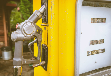 Yellow vintage fuel dispenser in ruralの写真素材