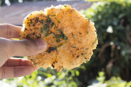 Kgawhie in hand,Food in Northeast Thailand.