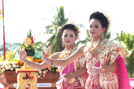SUKHOTHAI, THAILAND - NOVEMBER 10  A group of Thai dancers perform Thai dance in the occasion of Loy Krathong festival on November 10,2011 in Sukhothai, Thailand  のeditorial素材