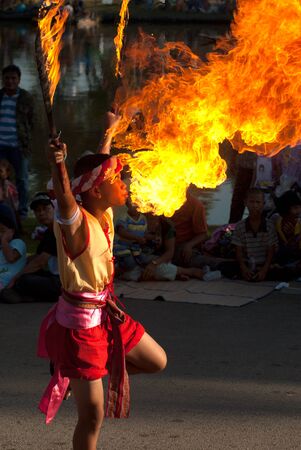 SUKHOTHAI, THAILAND - NOVEMBER 10  Thai men takes part in a parade of the Loy Krathong Festival in...