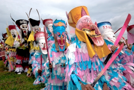 LOEI, THAILAND - JULY 1  Unidentified young people dress in spirit and wear a mask, sing and dance Phi Ta Khon Festival   Ghost mask festival   on July 1, 2011 in Loei, Thailand のeditorial素材