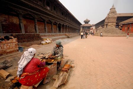 Nepalese womens to work in Bhaktapur old town in Nepal のeditorial素材