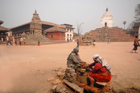 Nepalese womens to work in Bhaktapur old town in Nepal のeditorial素材