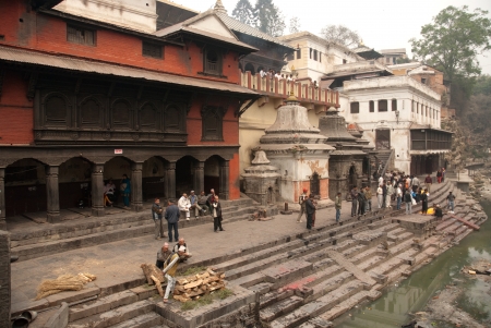 KATHMANDU, NEPAL - MARCH 15  Cremations are performed at Pashupatinath Temple on the banks of River Baghmati, March 15, 2012 in Kathmandu, Nepal  のeditorial素材