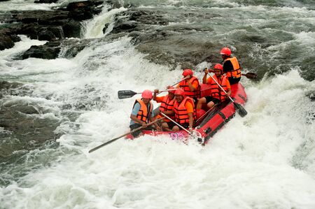PRAJINBURI,THAILAND -AUGUST 19     Muangtong  team in action at Rafting racing Hinperng s got challenge 2012 on Saiyai river in Khao Yai National park on August 19,2012 in Prajinburi,Thailand  のeditorial素材