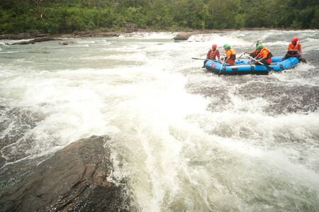 PRAJINBURI,THAILAND -AUGUST 19    Phatoe  team in action at Rafting racing Hinperng s got challenge 2012 on Saiyai river in Khao Yai National park on August 19,2012 in Prajinburi,Thailand   のeditorial素材
