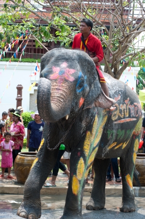 AYUTTAYA, THAILAND - APRIL-13   Songkran Festival is celebrated in a traditional New Year s Day from April 13 to 15, and dancing with elephants on April 13, 2012 in Ayuttaya, Thailand  のeditorial素材