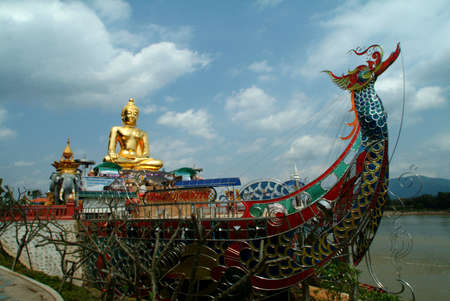 Golden Buddha on big boat in Northern of Thailand のeditorial素材