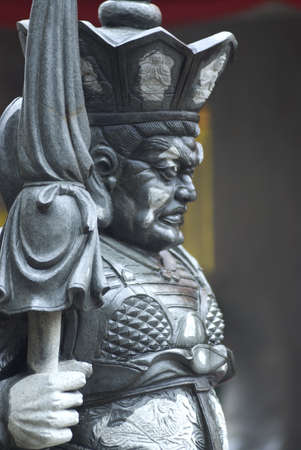 Chinese stone guardians sculpture in Chinese temple の写真素材
