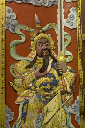 Chinese wood guardians sculpture in Chinese temple のeditorial素材