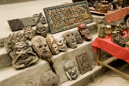 wood masks and souvenir being sold in the streets of Kathmandu city, Nepalのeditorial素材