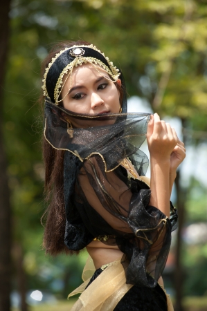 Pretty Asian woman in black Indian clothes in posing の写真素材