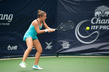 BANGKOK,THAILAND- NOV 29   Jeannine Prentner of Austria player tennis returns ball to Katharina Lehnert German player at semi final match,during Chang ITF Pro Circuit 2012 on November 29,2012 at Rama Garden Hotel in Bangkok,Thailand のeditorial素材