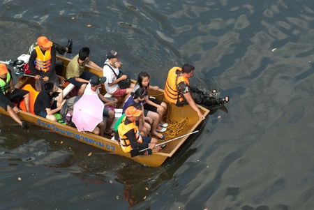 BANGKOK, THAILAND-NOVEMBER 2   Transportation of people in the streets flooded after the heaviest monsoon rain in 50 years in the capital on November 2, 2011 Arunaummarin Road, bangkok, のeditorial素材