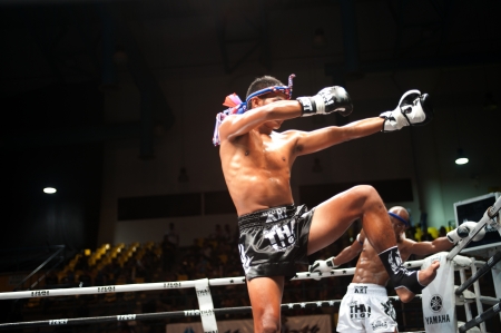 BANGKOK, THAILAND-SEPT 25  Unidentified fighters fight Muaythai at Thai Fight Muay Thai    The World s Unrivaled Fight at Thammasat University stadium on September 25, 2011 in Bangkok,Thailand  のeditorial素材