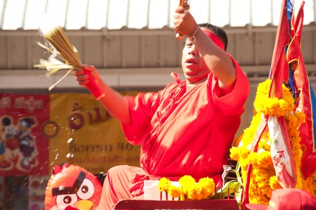 The Oracle give luck for peoples in parade show on Chinese New Year 2013 in Nakhonsawan Province,Middle of Thailand のeditorial素材