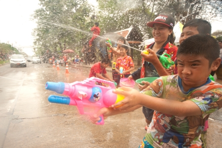 Peoples splashing water in Songkran festival のeditorial素材