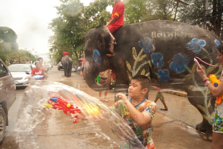Elephant splashing water in Songkran festival のeditorial素材