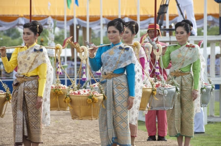 BANGKOK,THAILAND-MA Y 13 Unidentified Queen of the Plowing Ceremony holding gold and silver basket in the beginning to planting season in The Royal Plowing Ceremony on May 13,2013 at Bangkok,Thailand  のeditorial素材
