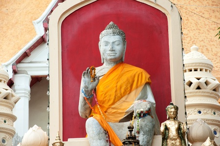 Ancient outdoor sitting Buddha at biggest Pagoda in Thailand の写真素材
