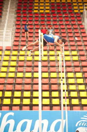 PHATUMTANI,THAILAND-SEPTEMBER,6   Men player action Pole Vault in Thailand Open Athletic Championship 2013 at Thammashat University stadium on September 6,2013 ,Phatumtani city in Middle of Thailand のeditorial素材