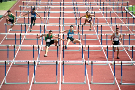 PHATUMTANI,THAILAND  SEPTEMBER,6   Groups of  player  action of 100 m  Hurdles in Thailand Open Athletic Championships 2013 at Thammashat University stadium on September 6,2013 in Phatumtani city ,Middle of Thailand  のeditorial素材